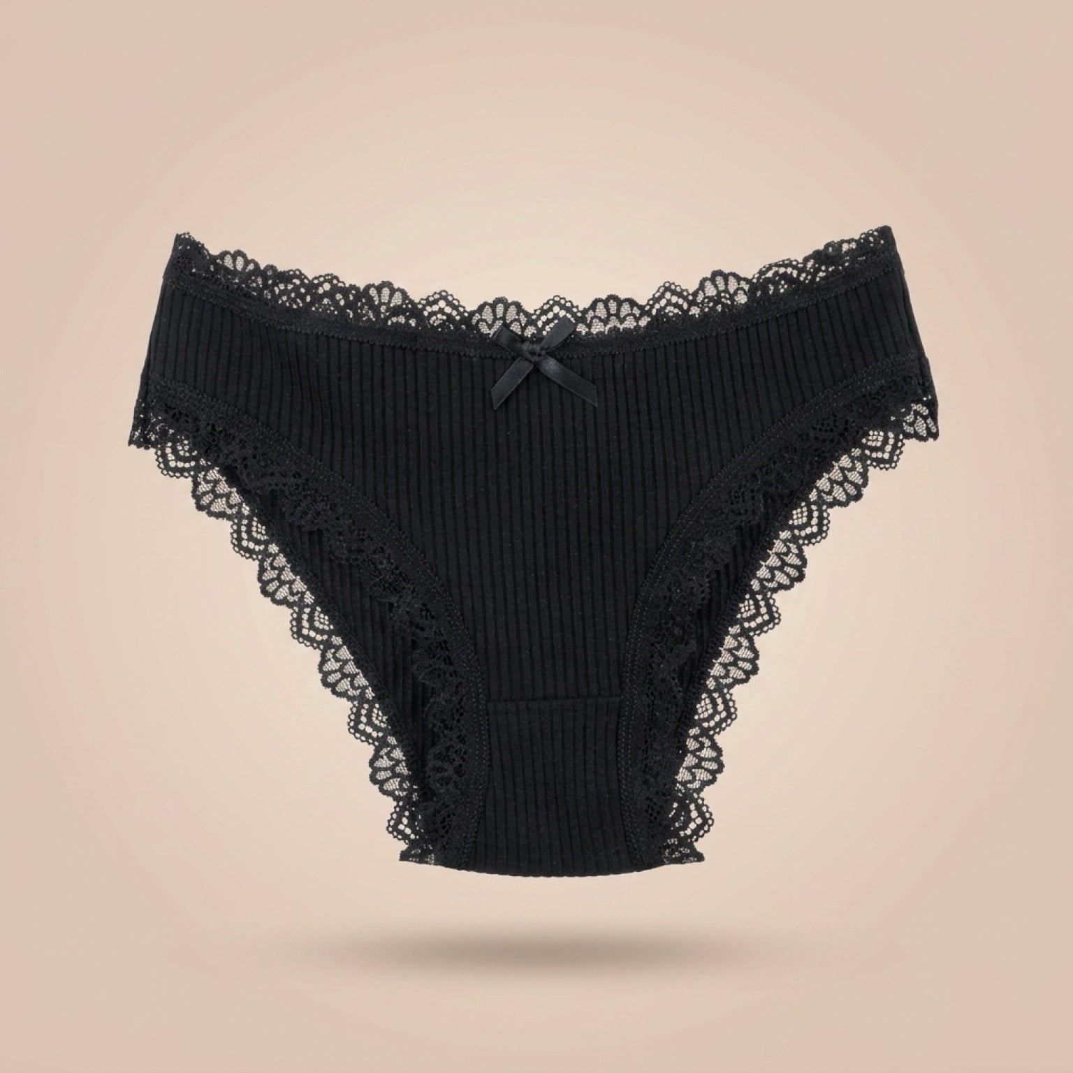 Black ribbed cotton bikini underwear for women with lace trim, front view on a neutral background